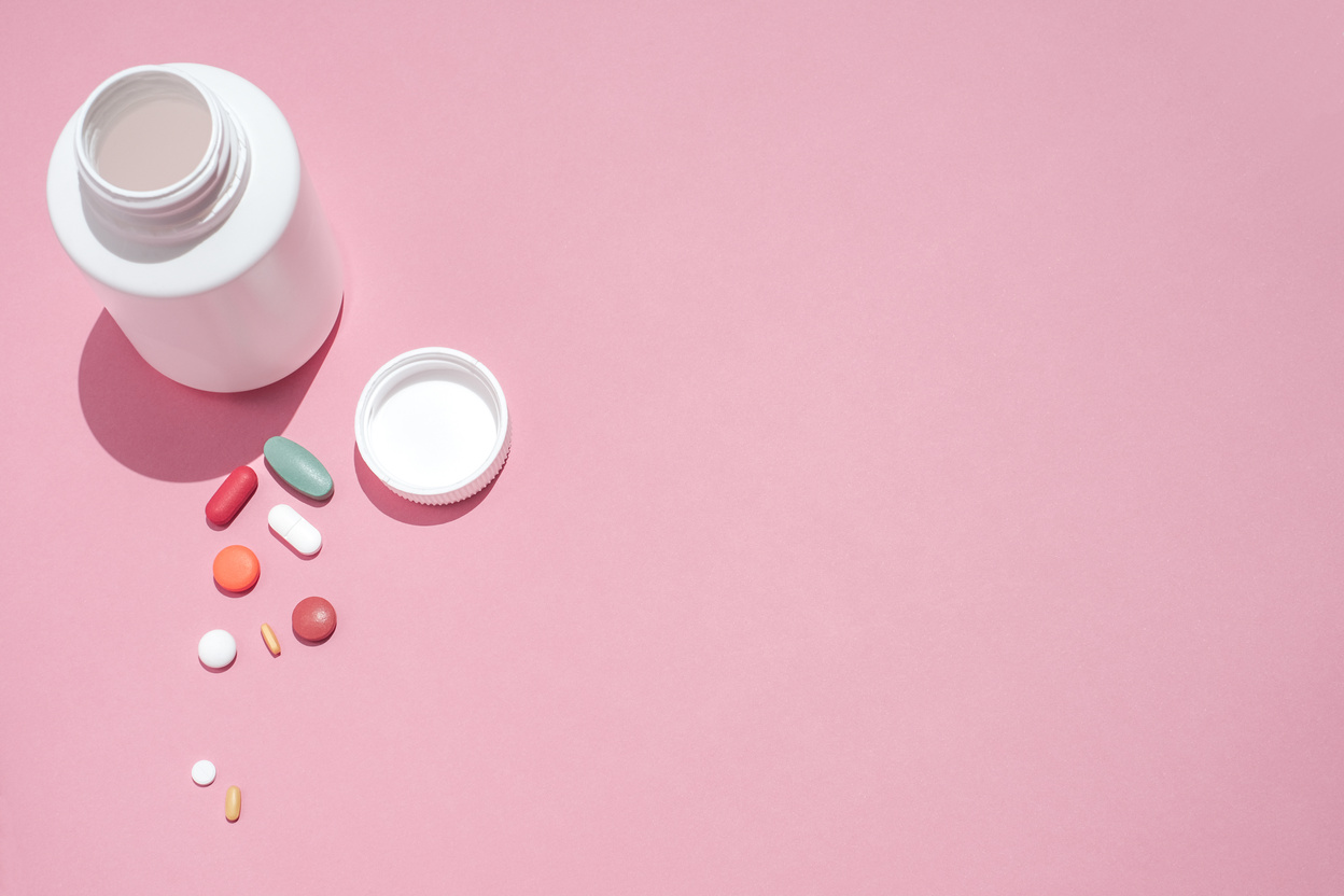 Medical Pills on Pink Background